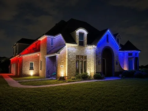 The same home in red, white, and blue, each section of roofline running its own color